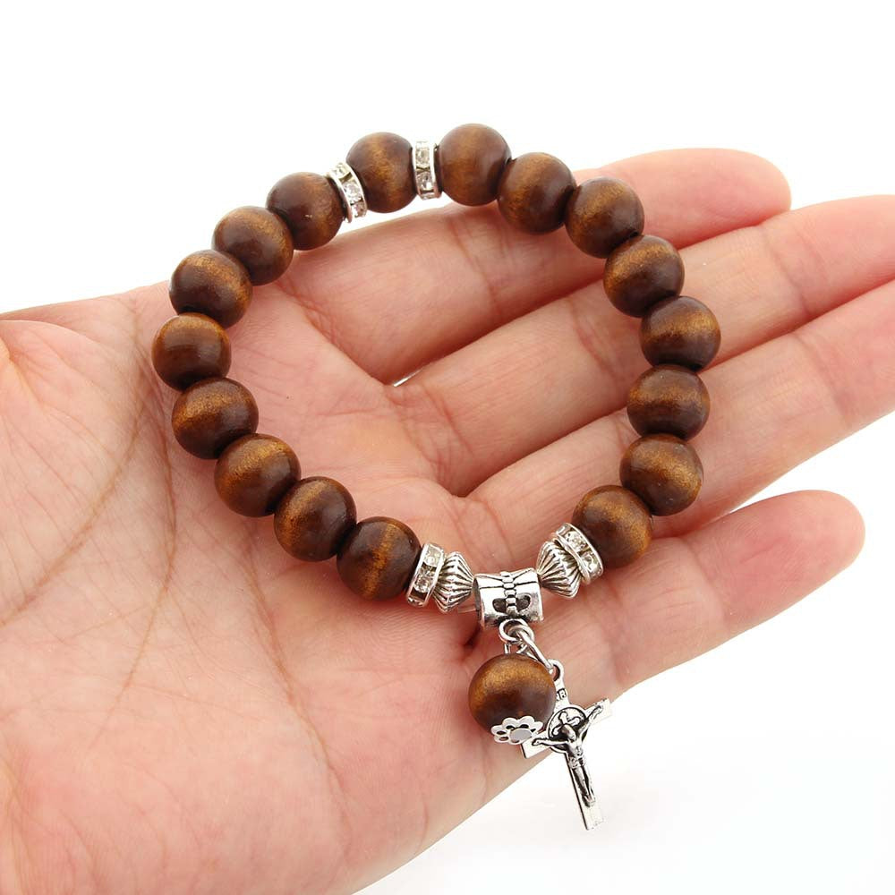 Pulseira de cordão elástico com crucifixo e contas de madeira marrom artesanal Amém