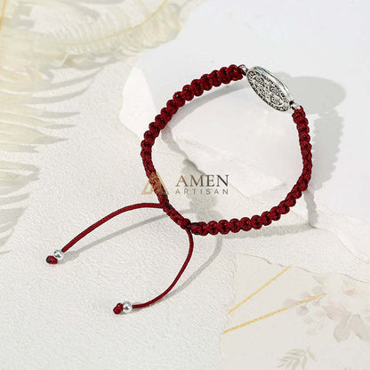 Pulsera trenzada con colgante artesanal con retrato de Jesús de Amén