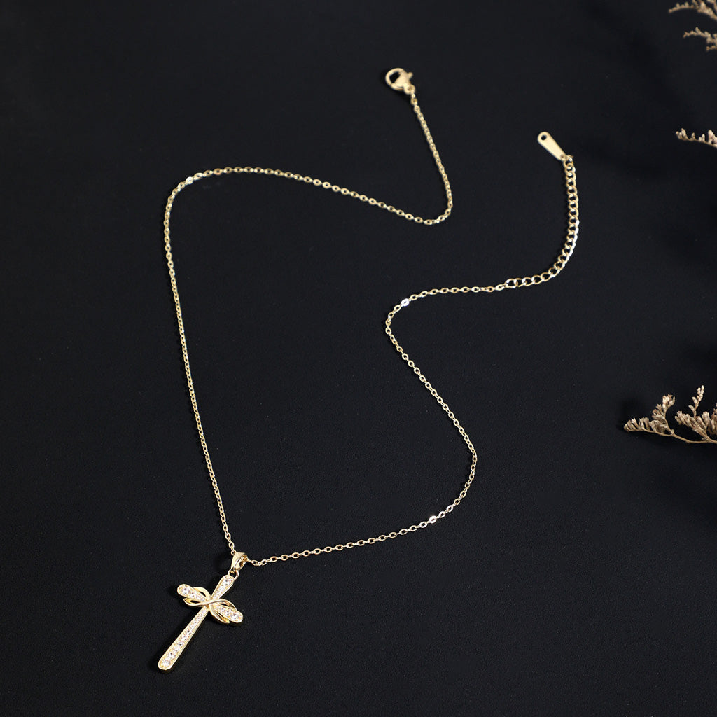 Intertwined Möbius Cross Necklace